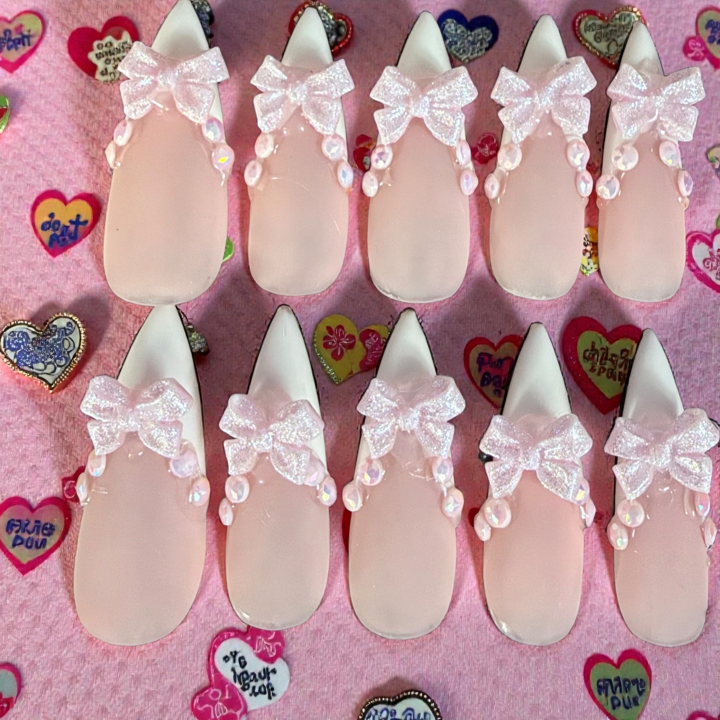 Long stiletto french tip with bows