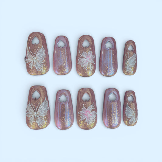 Pink Nails with Cut Out Hearts on the Tips (med coffin)